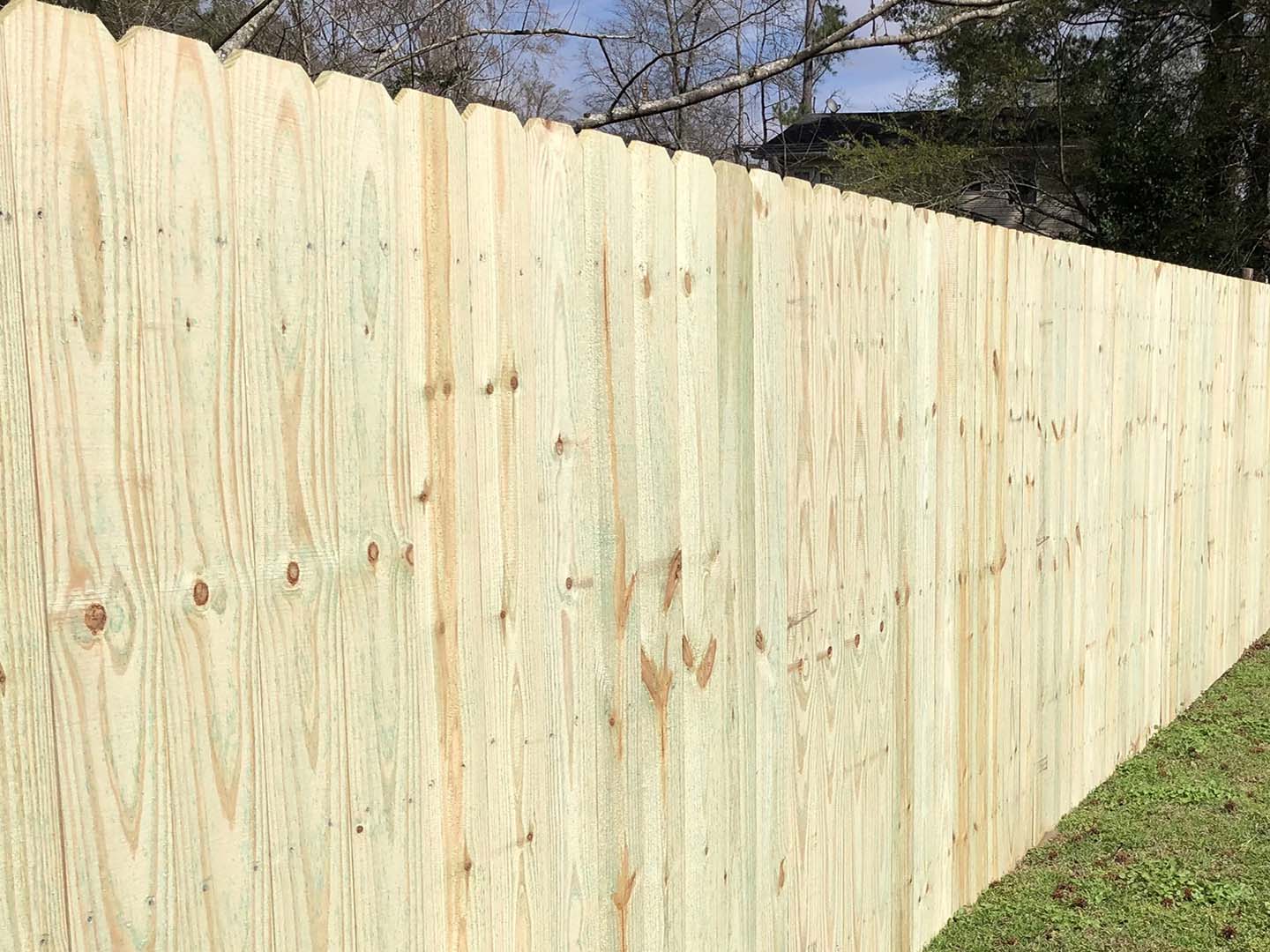 Hoover Al stockade style wood fence