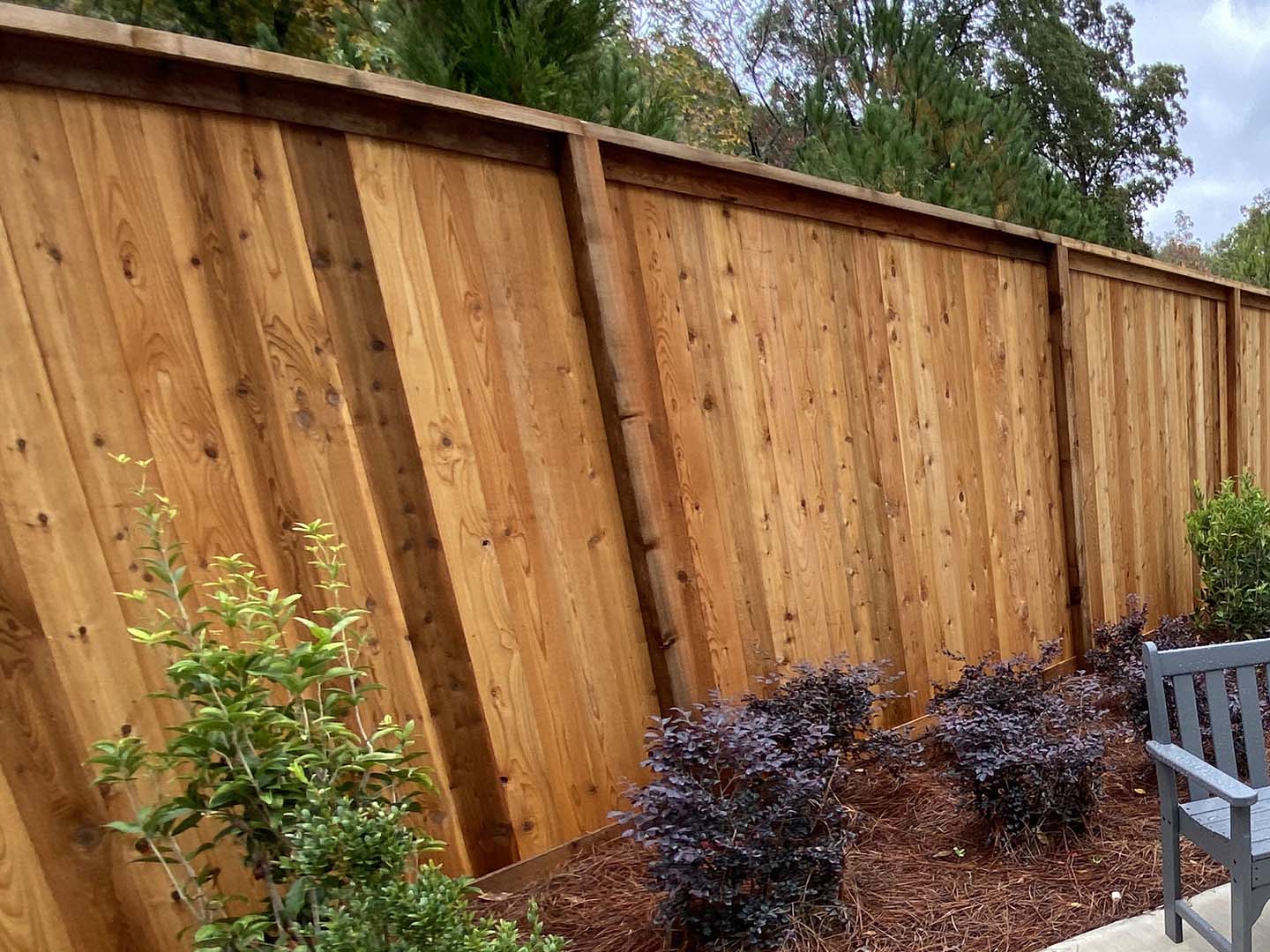 Pelham Al cap and trim style wood fence