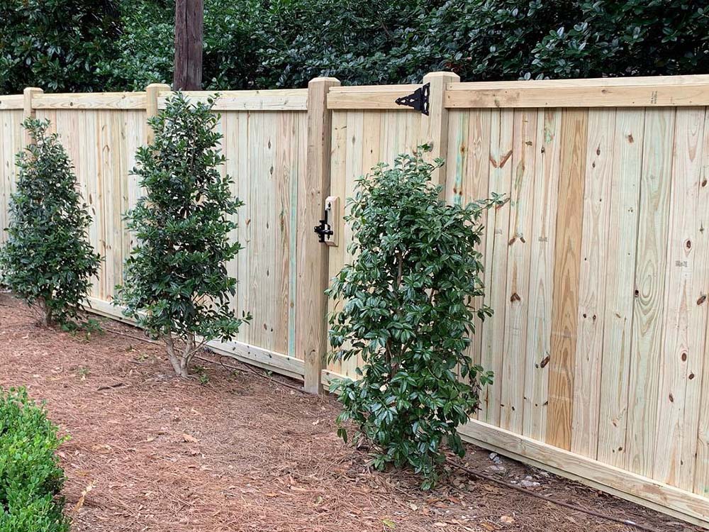 Rainbow City AL cap and trim style wood fence